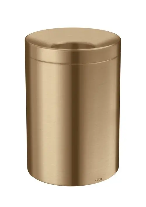 Brushed Bronze Abfalleimer mit runder Form, ausgestattet mit einem Deckel und der Marke AXOR. Der Eimer hat eine glänzende, metallische Oberfläche.